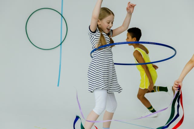 Kids playing with hula hoop